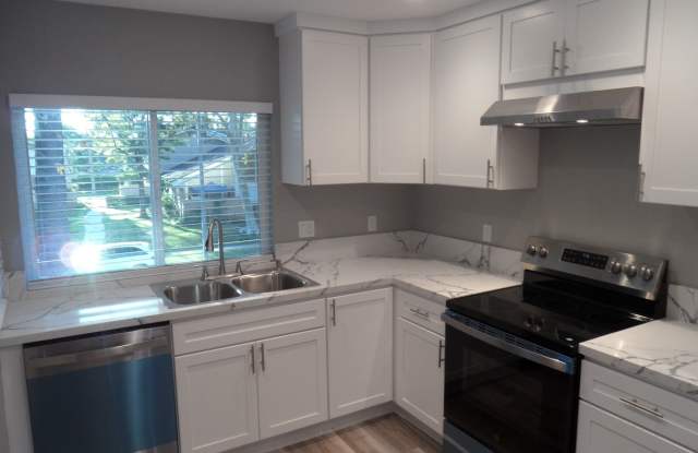 REMODELED 2BR; 1BA end unit condo w/ 1 car garage  1 parking space photos photos