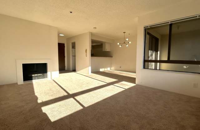 Tranquil Living in a Palo Alto Gem: 1-Bedroom Condo on the Third Floor with In Unit Laundry - 410 Sheridan Avenue, Palo Alto, CA 94306
