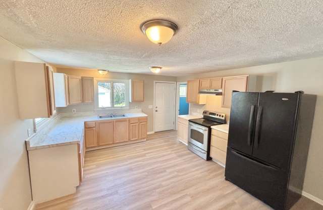 Spacious 5bd single family home | Off Street Parking | Updated kitchen photos photos