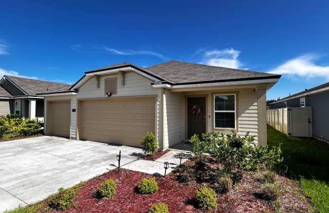 Picturesque Waterfront 4-Bedroom Home with Premium Amenities + 3 Car Garage photos photos