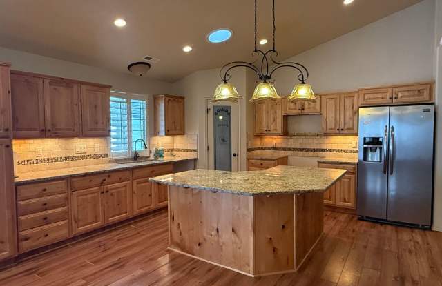 Beautiful patio home with 2 car garage, central air, fenced yard and covered patio photos photos