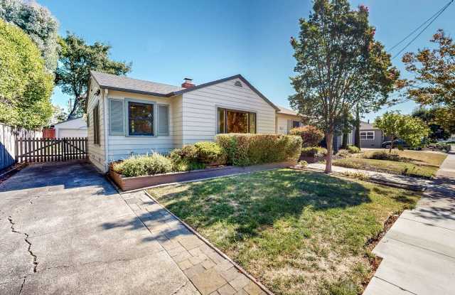 Bright & Cozy!  Conveniently located Three Bedroom Two Bath Single Level with Detached Two Car Garage! Gallery 4