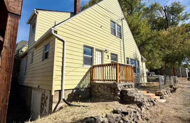 Newly updated 3bdrm, 2 bath house with large basement and covered parking. Gallery 1
