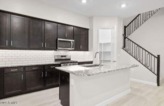 5062 E HARTFORD Avenue photos photos