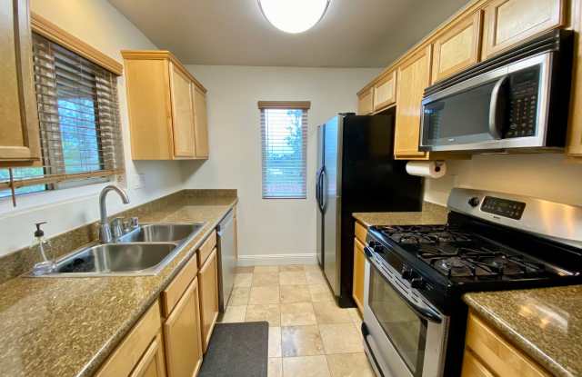 Spacious Two Bedroom featuring Ensuite Bathrooms! TWO ASSIGNED PARKING SPACES! Air Conditioning Included! photos photos