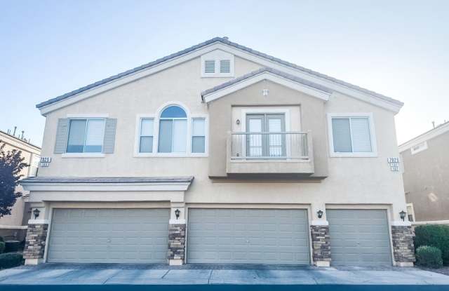 Charming 2 bedroom 2 bathroom townhome in Centennial Hills gated community with a pool! photos photos