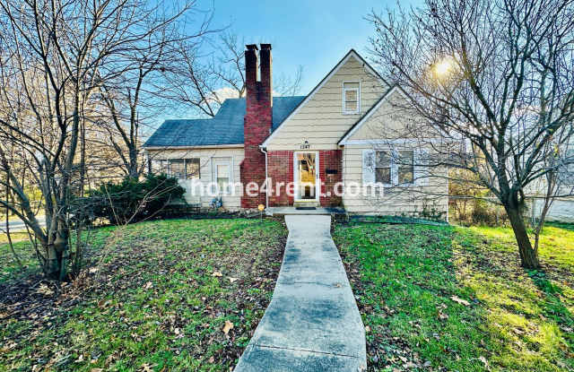 Adorable Home Featuring Wood Floors, SS Appliances, Updated Bathrooms and Plenty of Natural Light! photos photos