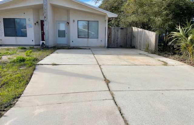 One Bedroom Property Available now! $250.00 off first months rent with approved application! - 3824 Dolphin Drive, Lower Grand Lagoon, FL 32408