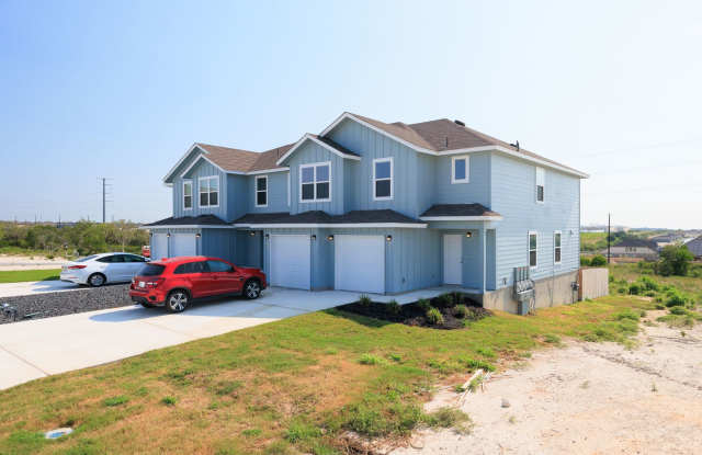 2 Week Free Move-In Special! Like-New 3-Bedroom Townhome in Hunters Ranch | Private Yard + Garage Gallery 1