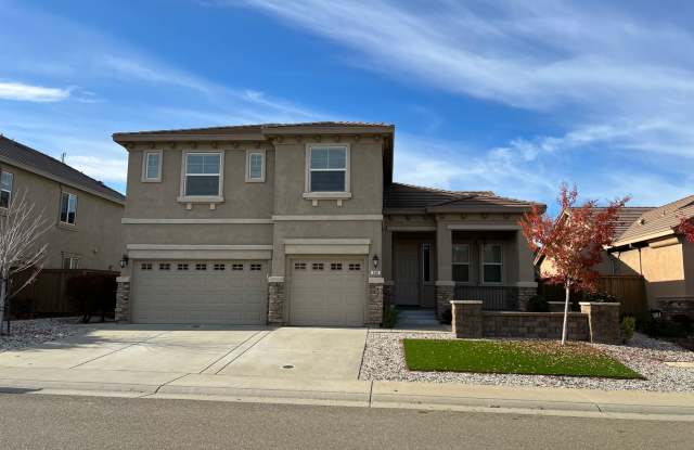 Desirable and Spacious 5-Bedroom Home in Empire Ranch! photos photos