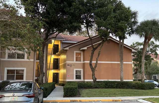 8955 Wiles Rd - 8955 Wiles Road, Coral Springs, FL 33067