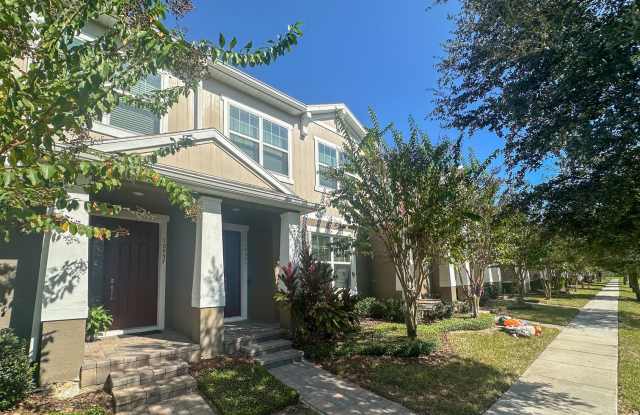 Spacious 4 Bedroom Townhome with Private Courtyard and Community Pool Gallery 1