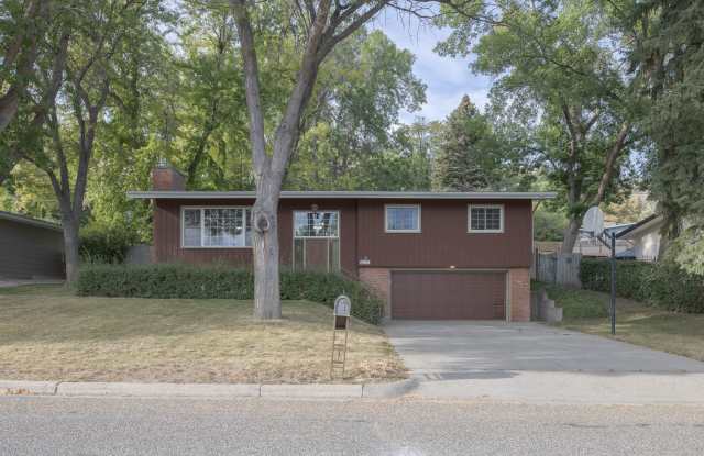 Charming 4-Bedroom Split-Level Home with Spacious Yard and Modern Comforts photos photos