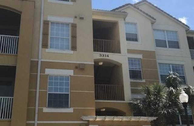Freshly Painted 3-Bedroom Condo in Gated Stonebridge Reserve – Prime MetroWest Location! Gallery 1
