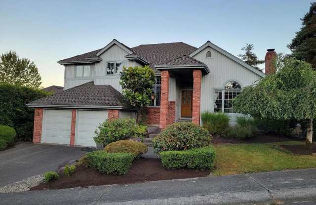 Spacious 3-Bedroom Home with Den and Private Backyard in Prime Location photos photos