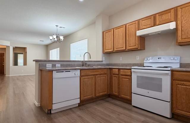 Beautiful plank flooring in this 4 bedroom home in Avondale Gallery 4