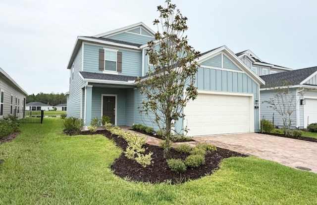 Beautiful 4-bedroom, 3-bathroom home available for rent in the desirable St. Augustine Lakes community. photos photos