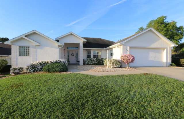 Stunning and meticulously cared for 3/2 in guard gated community!!! photos photos