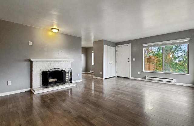 AVAILABLE NOW! Charming West Seattle Home featuring a garage, spacious deck, and wood-burning fireplace - 4124 23rd Avenue Southwest, Seattle, WA 98106