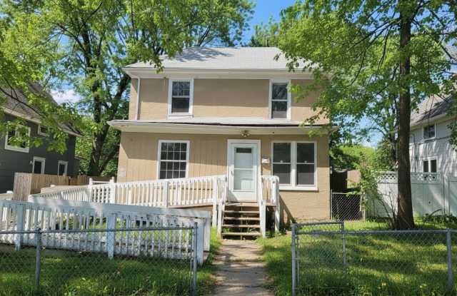 Come home to this great single family home with tons of charm and a beautiful yard - 3023 North Sheridan Avenue, Minneapolis, MN 55411