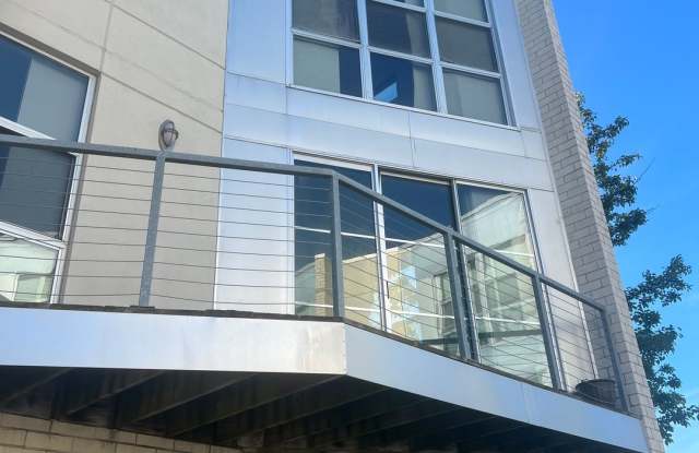 Huge 3-Story Riverfront Condo with 2-Car Garage Gallery 1