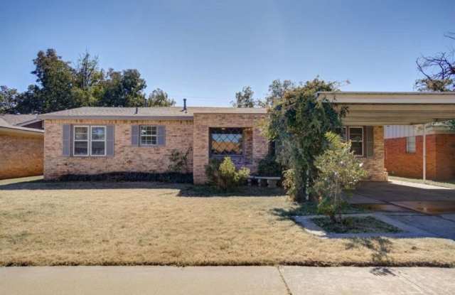 Spacious Four Bedroom - Available Now! Just minutes from Texas Tech. photos photos