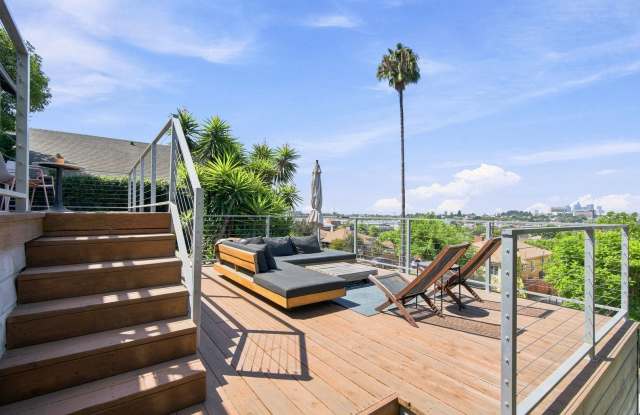 Charming Hillside Retreat with Modern Upgrades, Stunning City Views & Expansive Outdoor Living! Gallery 3