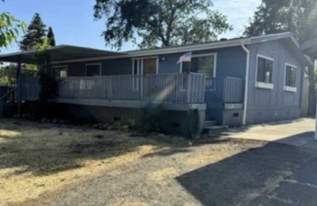Charming 2BR/2BA Country Home with Bonus Room, Expansive Yard, & Large Decks Gallery 1