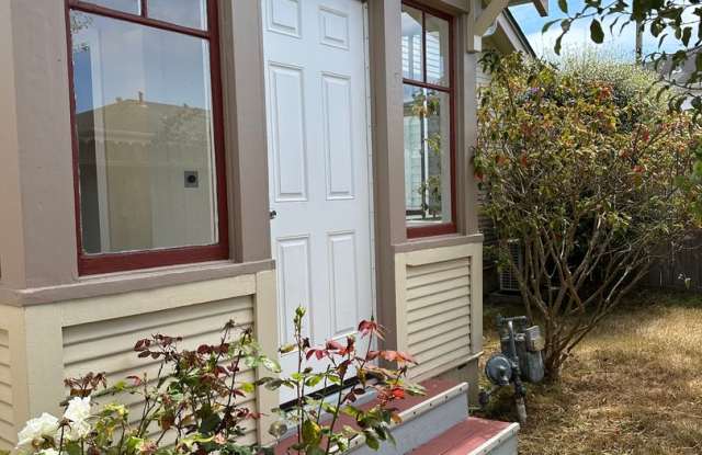 Charming 1 Bed, 1 Bath Cottage – Detached Garage + Sunroom! photos photos
