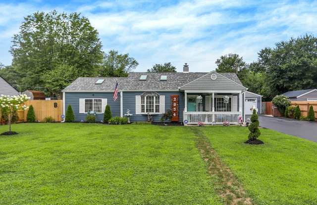 Charming Indianapolis Home with Modern Updates, Gorgeous Landscaping & 2-Car oversized garage photos photos