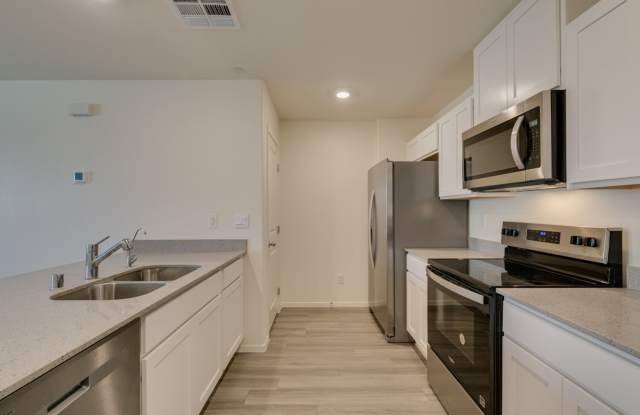 Gorgeous Townhome with upgrades in gated community* 3 large bedrooms, 2 car garage*Community pool, park, tennis courts pluse more* photos photos