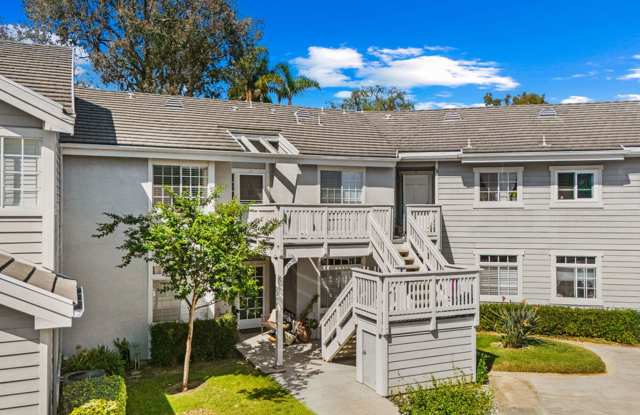 Serene Furnished 1/1 Top-Floor Coastal Condo with Balcony and Covered Parking Gallery 3