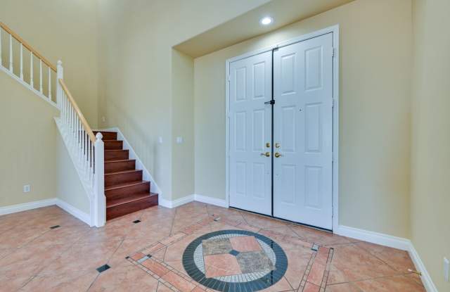 Summerlin!! 5 bedroom home!! W/Bed  bath downstairs!! 3 Car Garage!! Synthetic grass in front yard. Back has patio. Gallery 4