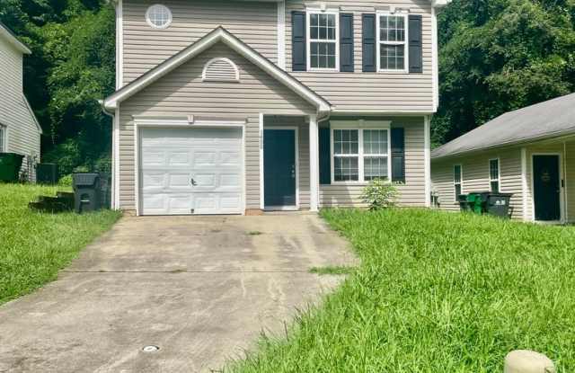 This delightful home boasts three spacious bedrooms and 2.5 well-appointed bathrooms. photos photos