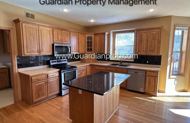 Brooklyn Park Single Family Home, Office, 3 Car Garage, New Carpet, Large Deck, Available Now photos photos