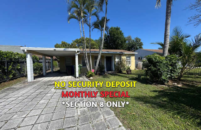 Large 4-1 house with car port and fenced backyard photos photos