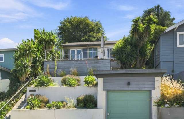 Charming Hillside Retreat with Modern Upgrades, Stunning City Views & Expansive Outdoor Living! Gallery 1