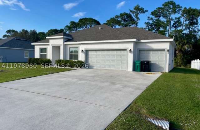 6157 NW Gatun Dr photos photos
