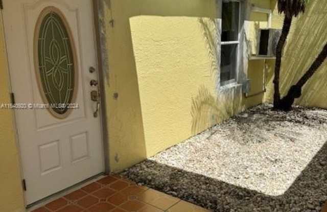 9436 SW 143rd Ct - 9436 Southwest 143rd Court, The Hammocks, FL 33186