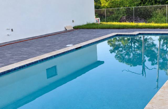Brand-New Pool Home with a Legal Mother-in-Law Suite in Lehigh Acres FL! Gallery 4