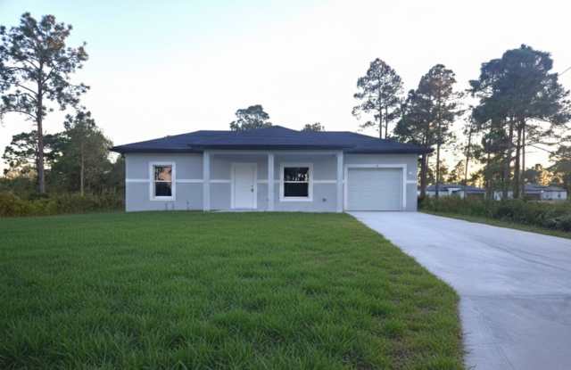BRAND NEW ONE BEDROOM, ONE BATH-ONE CAR GARAGE- SOUTH LEHIGH ACRES photos photos