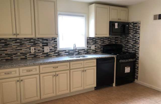 Charming 4 Bedroom Cape in Colonial Lake Neighborhood of Lawrence Twp.!! Recently Renovated Kitchen! Hardwood Floors! Large Back Deck and Yard! Gallery 4