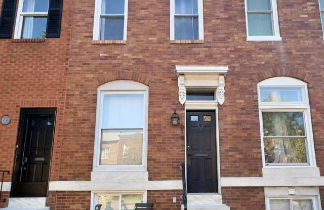 Charming 2 Bedroom/2.5 Bathroom Townhome with Modern Comforts  Prime Location Near Patterson Park photos photos