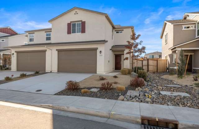 The Magnolia - 3 Bedroom plus loft, 2.5 Bath single family home with Full 2 Bay Garage and landscaped rear yard. - 1929 Silicone Drive, Sparks, NV 89436