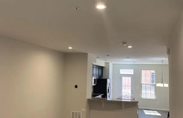 Modern 2BR + Office Townhome with Garage & Deck Near Hopkins Bayview Gallery 4