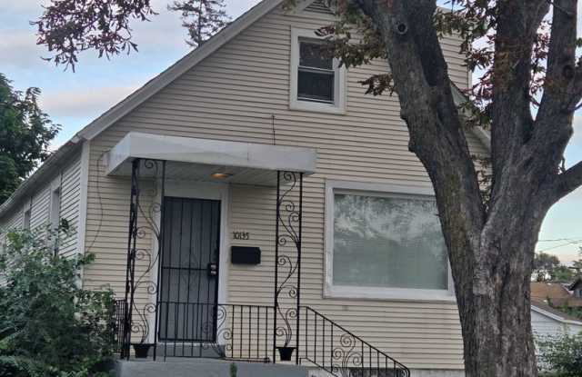4-Bedroom Home with Hardwood Floors and Finished Basement Gallery 1
