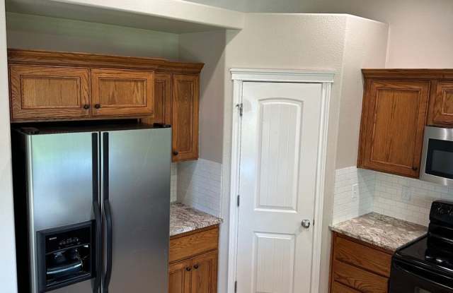 4-Bed Meridian Retreat Featuring Flexible Layout & Private Backyard (6- 7) month lease available Gallery 4