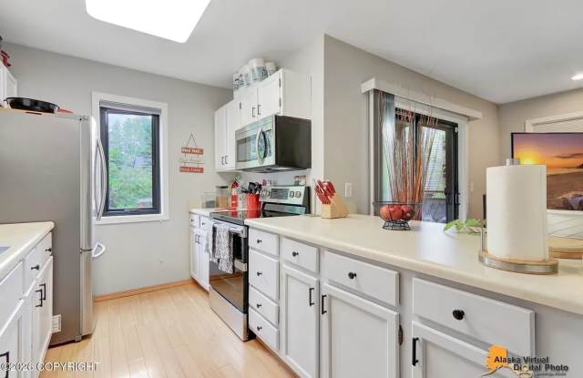 RARE FIND! Amazing 2 bed/2 bath Condo w/ in unit laundry + garage in highly requested neighborhood photos photos