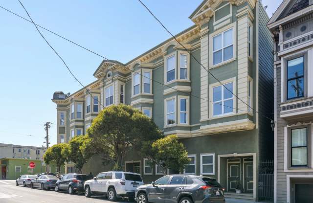 Bright pet friendly 3BR 2BTH with modern kitchen, wood flrs and laundry in unit! photos photos