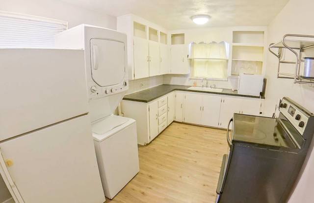3D Tour Available - Two Kitchens! + Fenced-in Yard + Patio  Fire Pit + Pet Friendly + Washer  Dryer Included! Available April 1st! - 404 South 18th Street, Manhattan, KS 66502